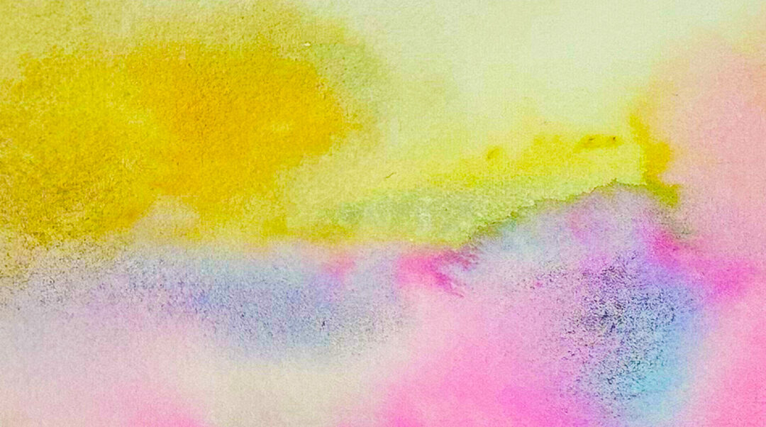 Abstract watercolor in yellows, blues, and pinks